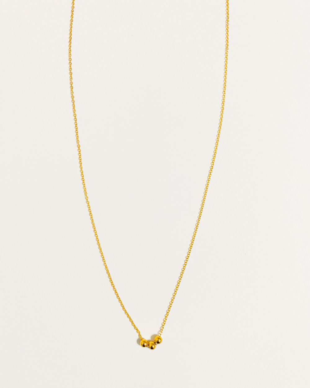 Collier pendentif en bille plaqué or