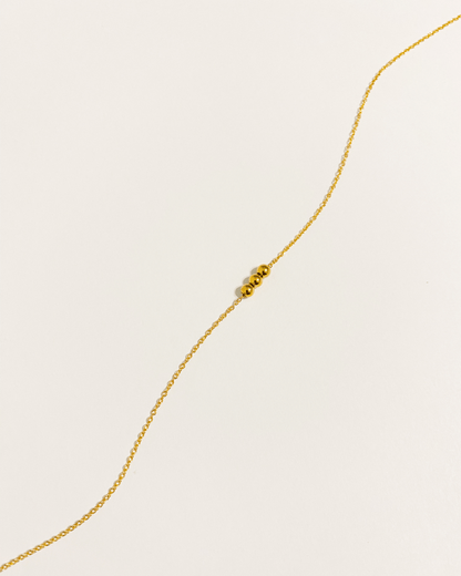 Collier pendentif en bille plaqué or