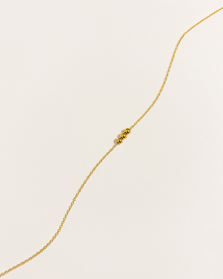 Collier pendentif en bille plaqué or